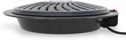Black electric grill with a power cord on a white background