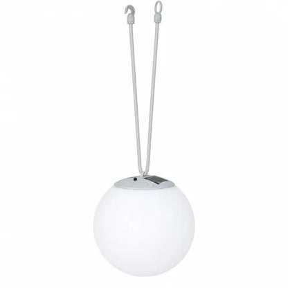 White spherical hanging solar light with a cord on a white background