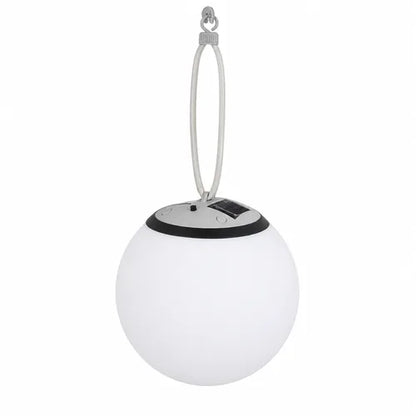 White spherical hanging light with solar panel on a white background