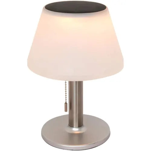 Table lamp with white shade and metallic base on a white background