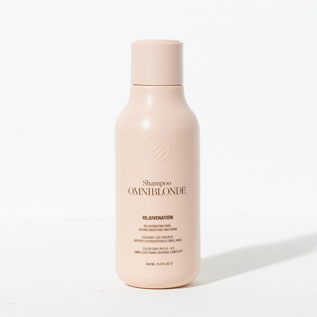Omniblonde shampoo bottle on a white background