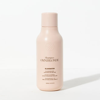 Omniblonde shampoo bottle on a white background
