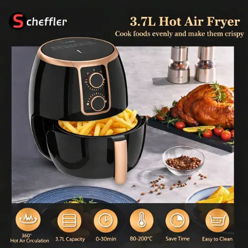 Black hot air fryer with food items on a gray surface, featuring Scheffler brand.